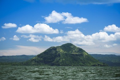 active taal volcano inside bigger crater lake near tagaytay in the philippines