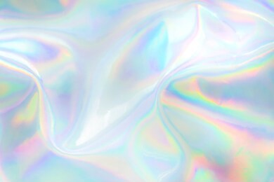 abstract trendy holographic background. real texture in pale violet, pink and mint colors with scratches and irregularities