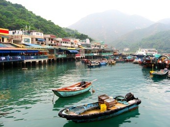 restaurants overlooking the sea in the small chinese port of the island of lamma, hong kong