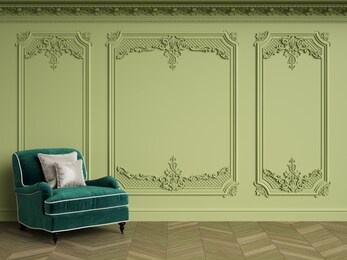 classic armchair in emerald velvet in classic interior with copy space.olive color walls with silvered mouldings,ornated cornice. floor parquet herringbone.digital illustration.3d rendering