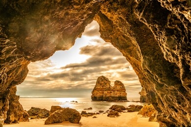 scenic cave with beautiful view on a famous beach near lagos, algarve, portugal