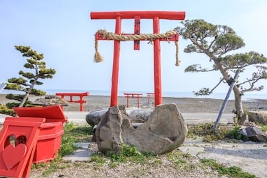 the floating torii gate of ouo shrine in ariake sea, tara town, saga prefecture, japan.(translated text: the god of the sea)