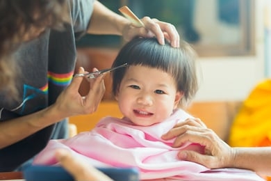 a barber is a person whose occupation is mainly to cut, dress, groom, style and shave men’s and boys' hair. a barber's place of work is known as a barbershop. this girl is cut her hair at her home.
