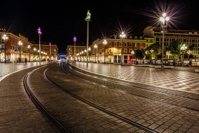tramline on place massena at night, nice, france