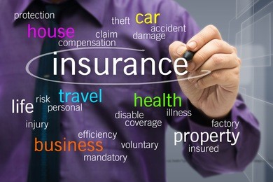 businessman writing insurance concept on screen
