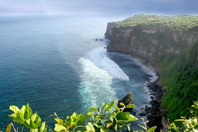 uluwatu-bali beach with high cliffs