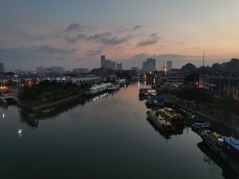 beautiful view of malacca harbour fron the bridge during early morning sunrise.