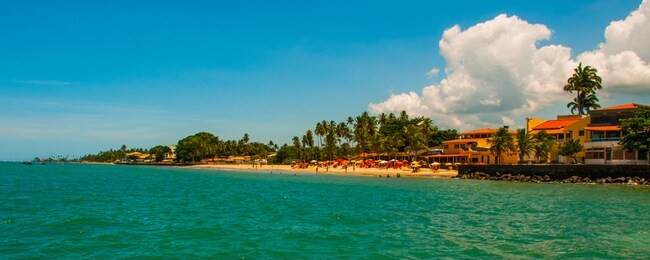 vera cruz, island itaparica, bahia, brazil: beautiful island with palm trees and a beach near the city of salvador.