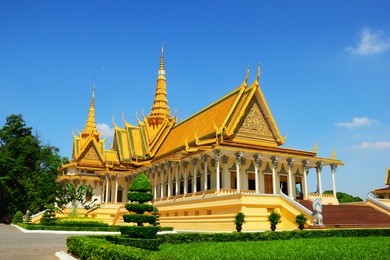 beautiful scenic view of royal palace against the background of clean blue sky at sunny days morning in pnom penh - the capital of cambodia, indochina