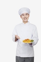 chef showing prepared food, studio shot