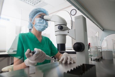 female researcher working in the chemical laboratory
