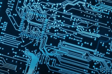 close up background of a blue electronic circuit board