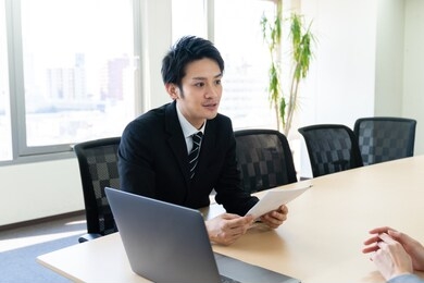 couple of businessperson in office.