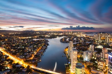 colorful sunset over suburbs, gold coast, australia