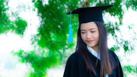 portrait of beautiful student on graduation day  