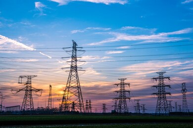 silhouette of power supply facilities at sunset