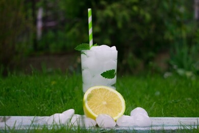 mojito cocktail with ice in the park