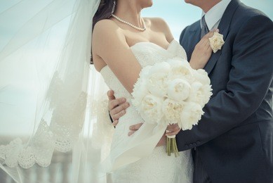 just married couple embraced