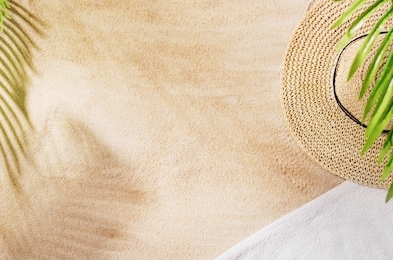 sandy beach background top view with visible sand texture. backdrop for mockups and advertising.