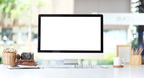 office desk workspace stuff with notepad, laptop and coffee cup mouse notepad shot. 
