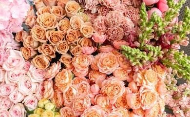 floral carpet or wallpaper. background of mix of flowers. beautiful flower for catalog or online store. floral shop and delivery concept. top view. copy space