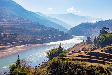 punaka valley with puna trang chu river, bhutan. punakha (dzongkha) is the administrative centre of punakha dzongkhag, one of the 20 districts of bhutan.