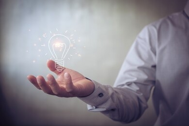 businessman holding icon light bulb,idea concept,,presenting new ideas.