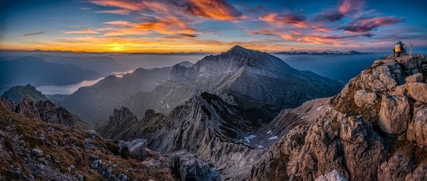 sunset view on the top of grigna meridionale - aka grignetta - in the lake of como district near lecco. red sky and a nice view. mountain landscape, italy