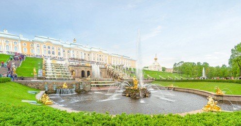 golden statue of samson in the park of peterhof, russia