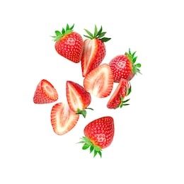 the composition of strawberries on white background. cut strawberries into pieces with copy space. fresh natural strawberry isolated. strawberry slices flying in the air