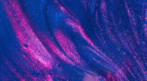 abstract textured neon gradient blue and ultraviolet background transparent slime. macro of kids toy slime.