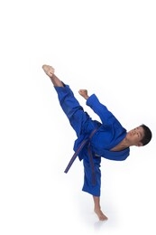 master blue 2 ii belt kid taekwondo show basic step of fighting pose, asian athletes boy black hair tanned skin exercise warm up in blue uniform bare foots, studio lighting white background copy space