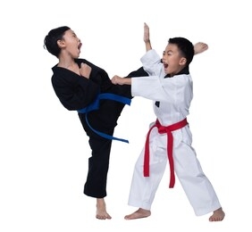 master red blue belt taekwondo kids show fighting pose, asian teenager boys athletes exercise warm up in black white uniform pants bare foots kick punch, studio lighting white background copy space