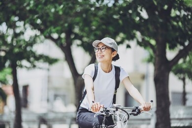 japanese woman riding a bicycle