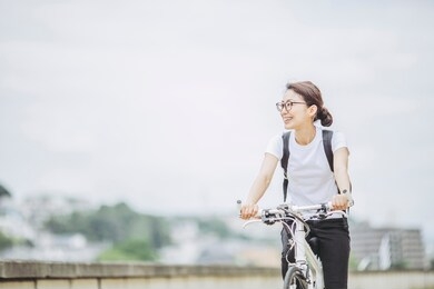 japanese woman riding a bicycle