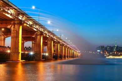 banpo bridge show on han river taken at night. seoul famous landmark, with the view of seoul n tower. south korea. 