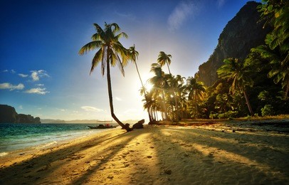 the beautiful sandy beach at sunset on the island in el nido. philippines