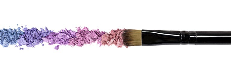 professional make-up brush on colorful crushed eyeshadow