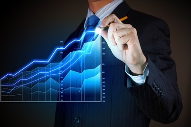closeup image of businessman drawing 3d graphics