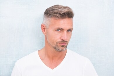 grizzle hair suits him. deal with gray roots. man attractive well groomed facial hair. barber shop concept. barber and hairdresser. man mature good looking model. silver hair shampoo. anti ageing.