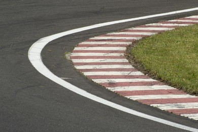 sleek asphalt on the corner of the motorbike track, motogp