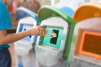 put trash in trash by the classification of garbage. environmental safe concept