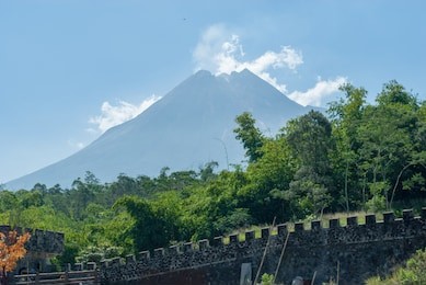 the view of the peak of mount merapi during the day was seen from the cangkringan area, yogyakarta indonesia