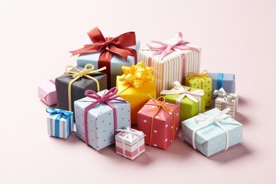 cute gift boxes on pink background.  cute gift boxes with cute bow.  