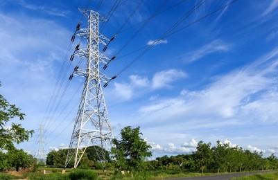 high voltage post.high-voltage tower on blue sky