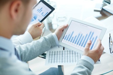 close-up of business people working with touchpads