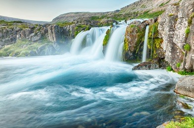 dynjandi is the most famous waterfall of the west fjords and one of the most beautiful waterfalls in the whole iceland. it is actually the cascade of waterfalls