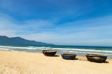 basket boats on my khe beach in danang. traditional vietnamese small fishing boats on my khe beach in danang, vietnam.