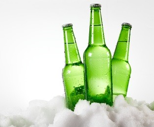 beer bottles in snow