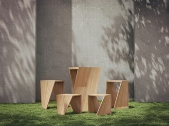 wooden pedestal for display,platform for design,blank product stand on lawn with trees shadow on the wall .3d rendering.